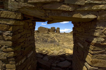 A kiva passage gives a view to the Pueblo Pintado ruins on Tuesday. © 2011 Gallup Independent / Adron Gardner 